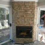 Artistic Stone Wall Tiling to Fireplace
